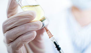 smiling man measuring his waist with tape measure wearing plain white t-shirt showcasing fitness goals and healthy lifestyle options 2 steps to success